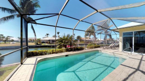 Waterfront 3 Bed Plus Den 3 Bath Home,Heated Pool w/ Large Screened-In Lanai!